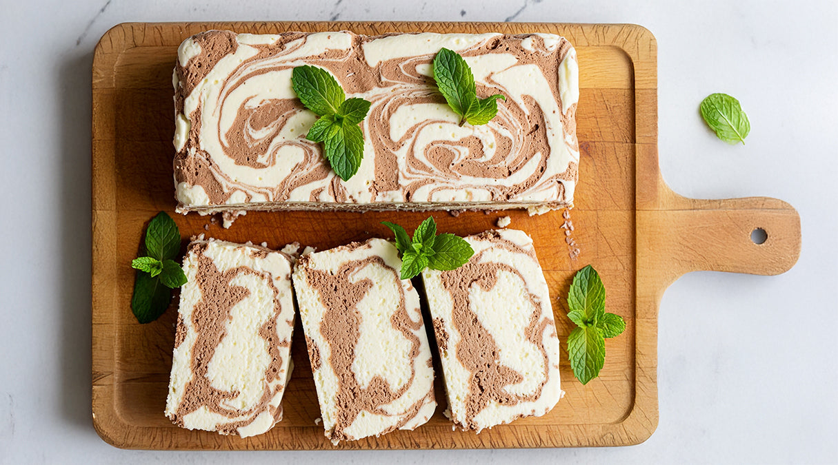 This fresh mint stracciatella is a mint recipe. This is an overhead view of sliced mint stracciatella ice cream on a cutting board.  